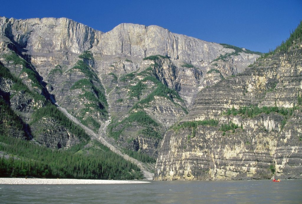 Figure 6: Nahanni National Park Reserve - Structural remains on the right and background